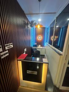 an office with a reception desk in a room at Star light in Nagpur