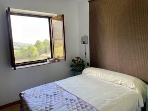 Postel nebo postele na pokoji v ubytování Eco Maset, alojamiento rural rodeado de naturaleza
