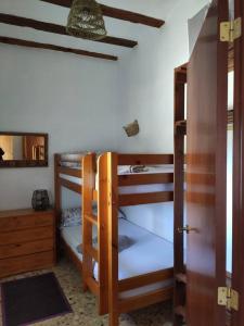 Postel nebo postele na pokoji v ubytování Eco Maset, alojamiento rural rodeado de naturaleza
