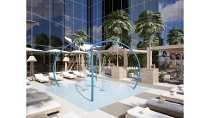 Bazén v ubytování Hotel Local Dubai at Jumeirah Village Triangle nebo v jeho okolí