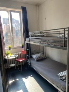 Postel nebo postele na pokoji v ubytování Bla Bla Hostel