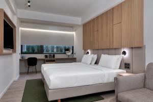 Postel nebo postele na pokoji v ubytování Hilton Garden Inn Athens Syggrou Avenue + 37 fotografií