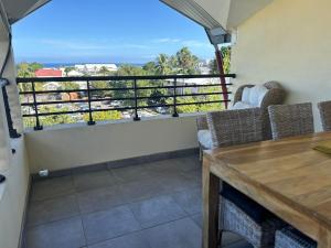 Μπαλκόνι ή βεράντα στο Appt Sweethome vue mer à Saint-Leu - classé 3