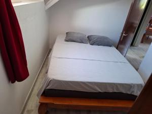 Postel nebo postele na pokoji v ubytování Chambre double