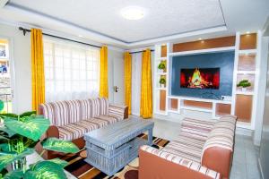Zona d'estar a Blink comfort suite -Zebra
