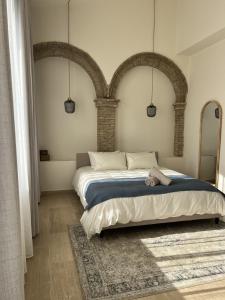 Postel nebo postele na pokoji v ubytování Elysium Luxury Stays