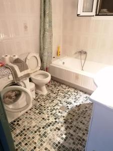 Kúpeľňa v ubytovaní A Central Apartment + 29 fotografií