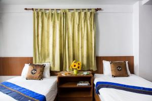 Postel nebo postele na pokoji v ubytování Eco Hostel Hua Hin