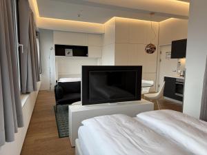 Posteľ alebo postele v izbe v ubytovaní Skyline City Loft