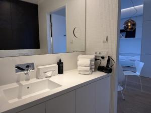Kúpeľňa v ubytovaní Skyline City Loft