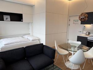 Posteľ alebo postele v izbe v ubytovaní Skyline City Loft