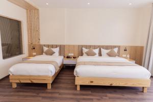 Postel nebo postele na pokoji v ubytování Hotel Chautari pvt ltd