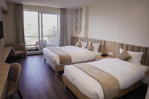Postel nebo postele na pokoji v ubytování Hotel Chautari pvt ltd