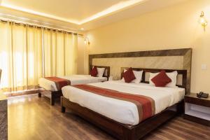 Postel nebo postele na pokoji v ubytování Hotel Chautari pvt ltd