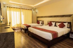 Postel nebo postele na pokoji v ubytování Hotel Chautari pvt ltd