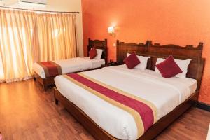 Postel nebo postele na pokoji v ubytování Hotel Chautari pvt ltd