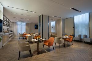 Khu vực ghế ngồi tại Starry Sky Garden Hotel Wuhan Hankou Railway Station Zhuyeshan Subway Station Branch