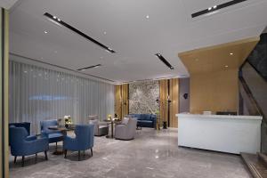 Khu vực ghế ngồi tại Starry Sky Garden Hotel Wuhan Hankou Railway Station Zhuyeshan Subway Station Branch
