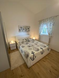 Posteľ alebo postele v izbe v ubytovaní Apartment Megy