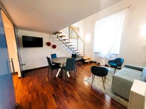 TV a/nebo společenská místnost v ubytování Appartamento Vista Mare