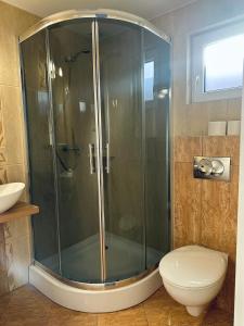 Et badeværelse på Domki Wakacyjne Rybak