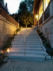 a set of stairs in front of a building at Le Manoir in Saint-Imier