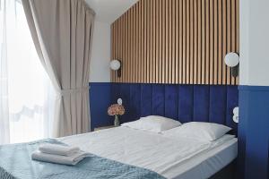 Postel nebo postele na pokoji v ubytování Baltic Hotel