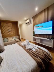 Giường trong phòng chung tại Coast Haven 204 Sliema Malta +7 ảnh