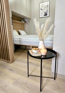 Postel nebo postele na pokoji v ubytování Pine Point Apartament with shared Pools, Jacuzzi, Sauna & Gym