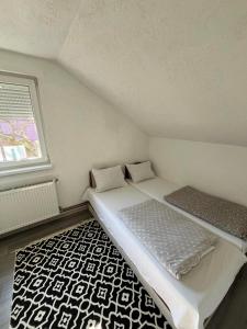 Ліжко або ліжка в номері Apartman All seasons
