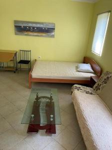 Ένα ή περισσότερα κρεβάτια σε δωμάτιο στο Breezz