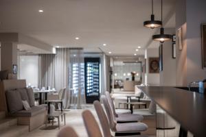 Uma área de estar em HOTEL & SPA Goldene Rose