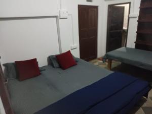 Postel nebo postele na pokoji v ubytování Ramaya Homestay