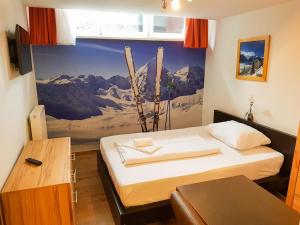 Posteľ alebo postele v izbe v ubytovaní Studio Alpin -10A by Four Seasons Apartments