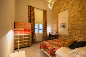 Postel nebo postele na pokoji v ubytování Canvas Boutique Hotel