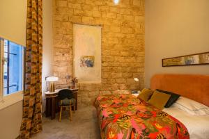 Postel nebo postele na pokoji v ubytování Canvas Boutique Hotel