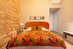 Postel nebo postele na pokoji v ubytování Canvas Boutique Hotel