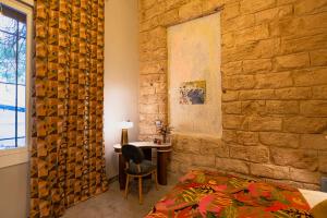 Postel nebo postele na pokoji v ubytování Canvas Boutique Hotel