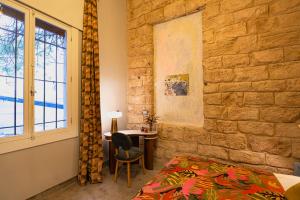 Postel nebo postele na pokoji v ubytování Canvas Boutique Hotel