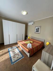 Postel nebo postele na pokoji v ubytování Exclusive PrivateBeach - Explora Lake 1