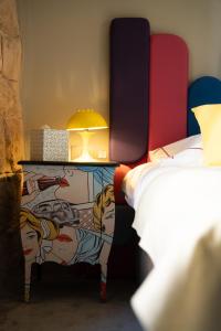 Postel nebo postele na pokoji v ubytování Canvas Boutique Hotel