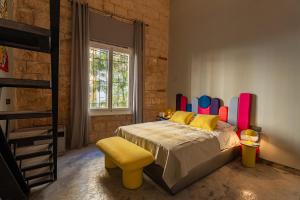 Postel nebo postele na pokoji v ubytování Canvas Boutique Hotel