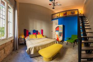 Postel nebo postele na pokoji v ubytování Canvas Boutique Hotel