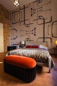 Postel nebo postele na pokoji v ubytování Canvas Boutique Hotel