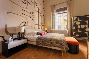 Postel nebo postele na pokoji v ubytování Canvas Boutique Hotel