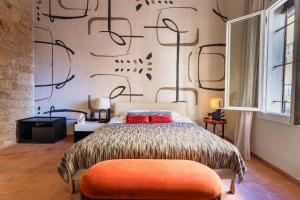 Postel nebo postele na pokoji v ubytování Canvas Boutique Hotel