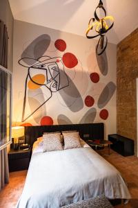 Postel nebo postele na pokoji v ubytování Canvas Boutique Hotel