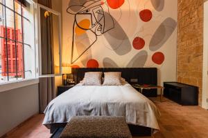 Postel nebo postele na pokoji v ubytování Canvas Boutique Hotel