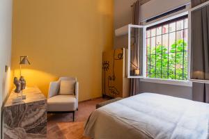 Postel nebo postele na pokoji v ubytování Canvas Boutique Hotel