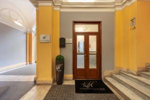 Posteľ alebo postele v izbe v ubytovaní Al Viminale Hill Inn & Hotel